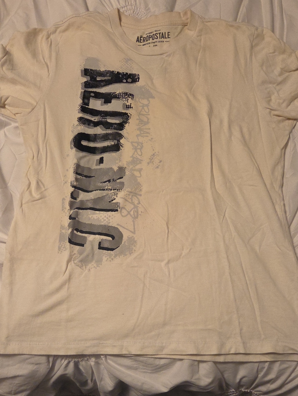 Aeropostale Men's Cream Short-Sleeve Graphic Tee with Vertical Logo